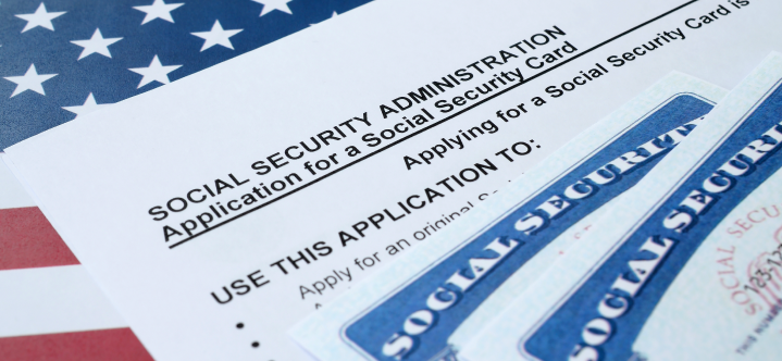 Young professional researching EB-1 extraordinary ability and U.S. immigration options on a laptop